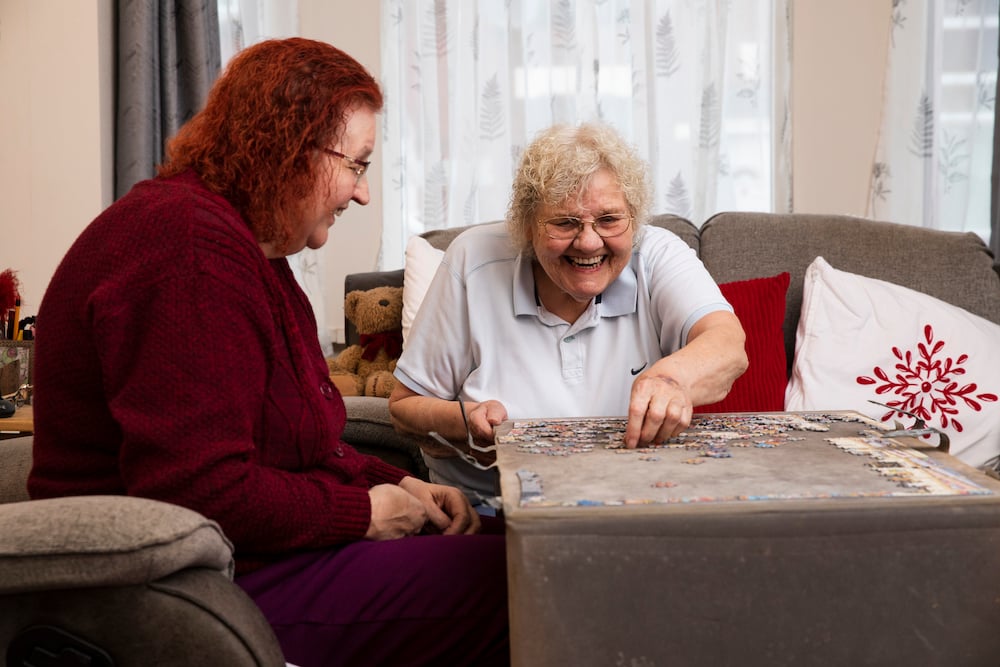 LGBTQ+ couple playing a game